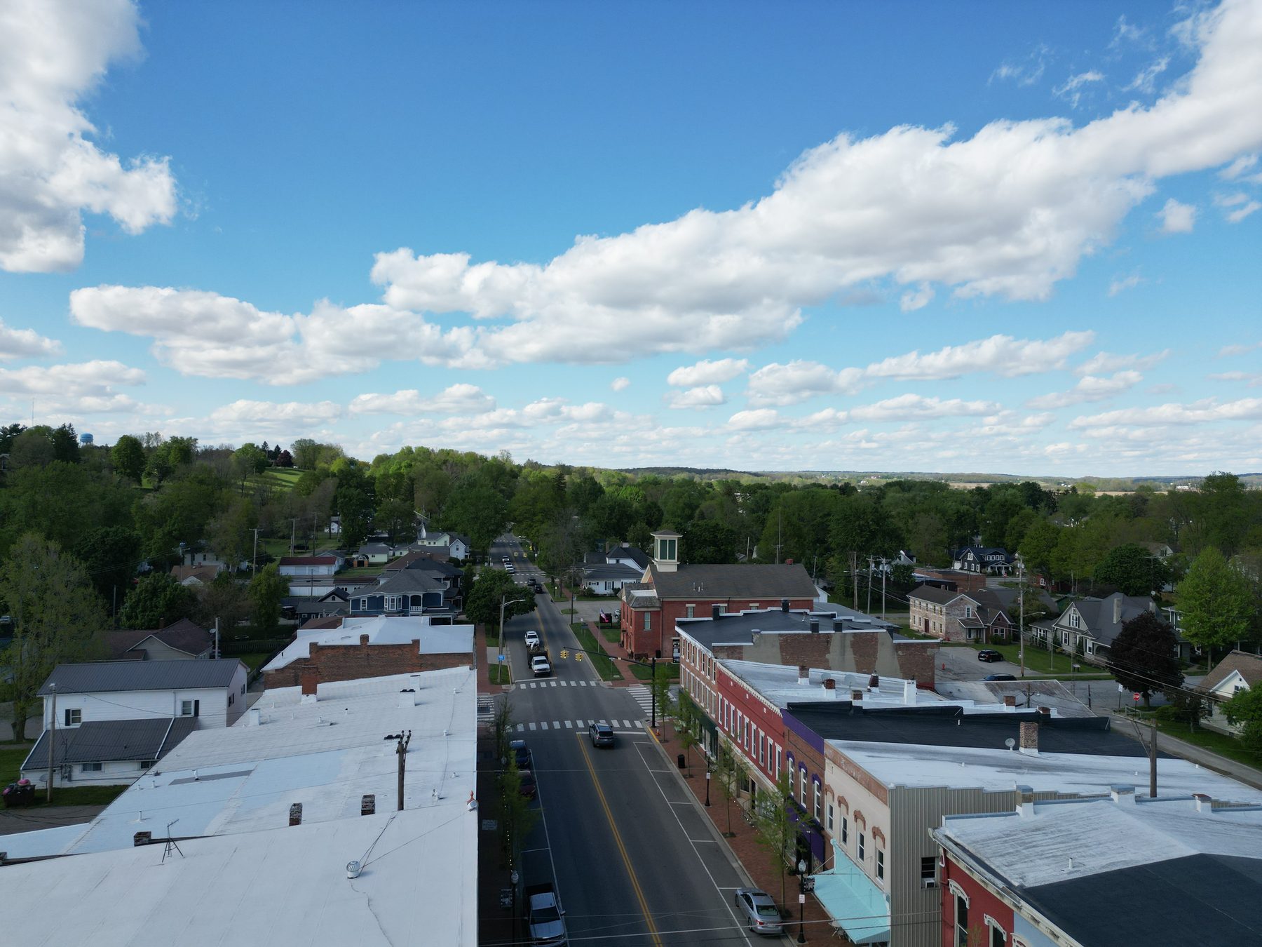 Downtown West Liberty from above, with the business district along the main street and farmland on the horizon