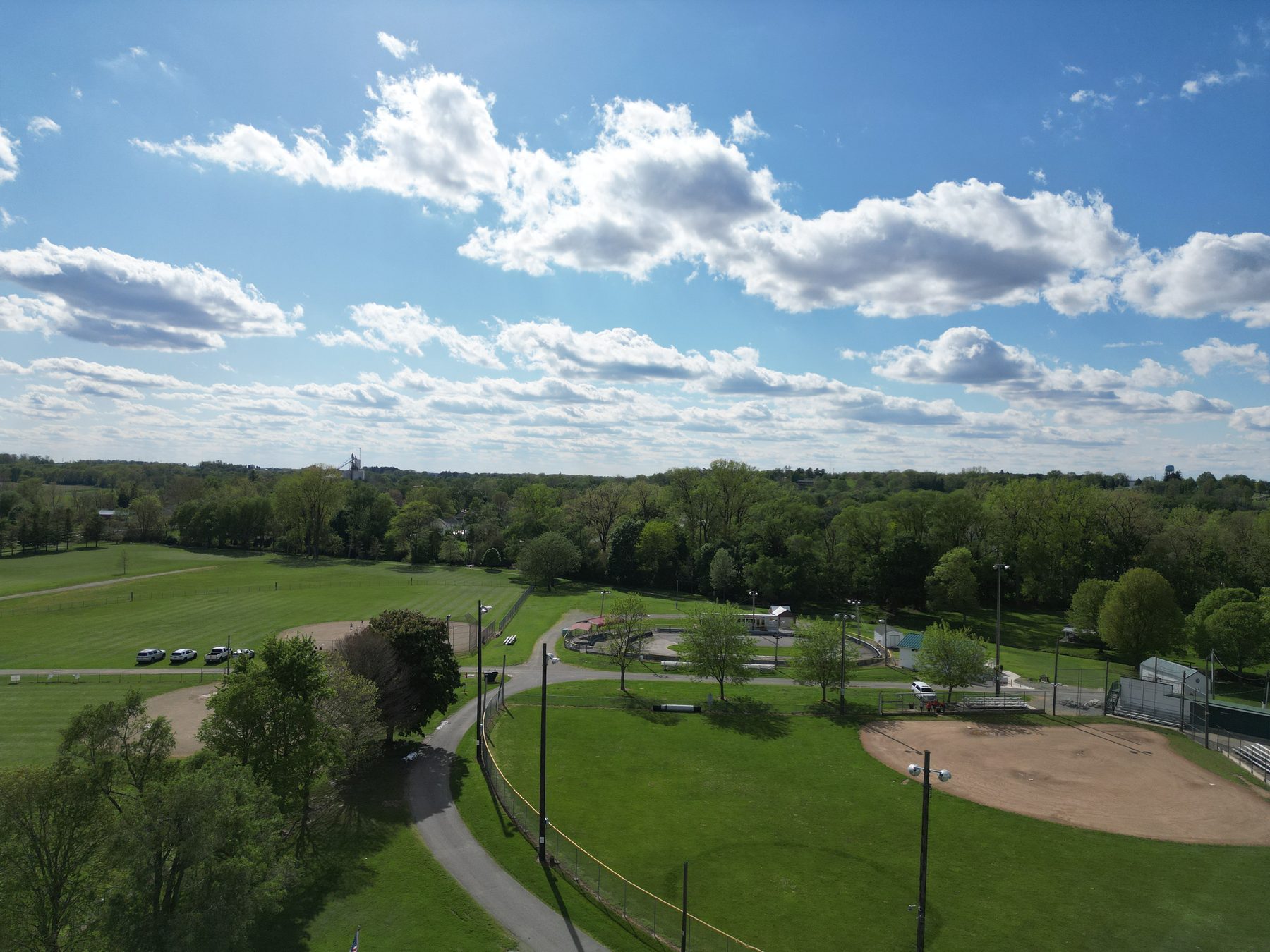 Lions Club Community Park from the air, with ball diamonds, a walking track and shelters set among trees